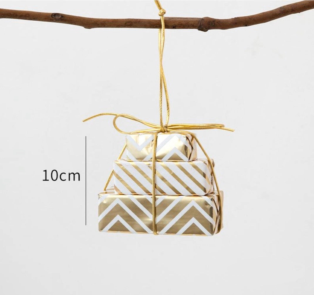 Golden stacked gift box ornament