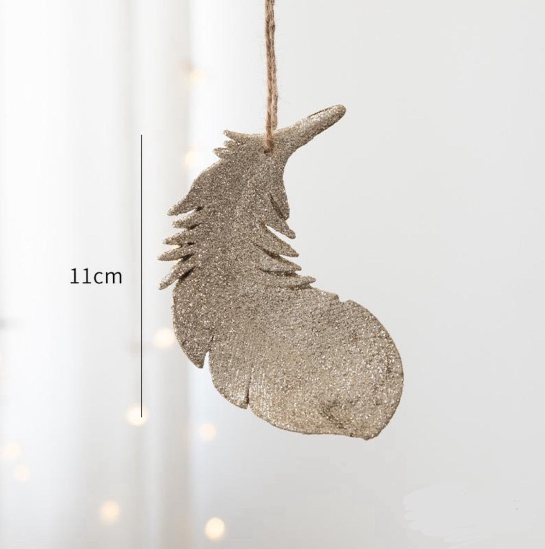 Golden feather ornament